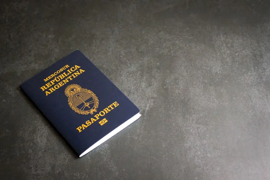 High-quality image of an Argentinian passport on a dark slate background, ideal for travel themes.